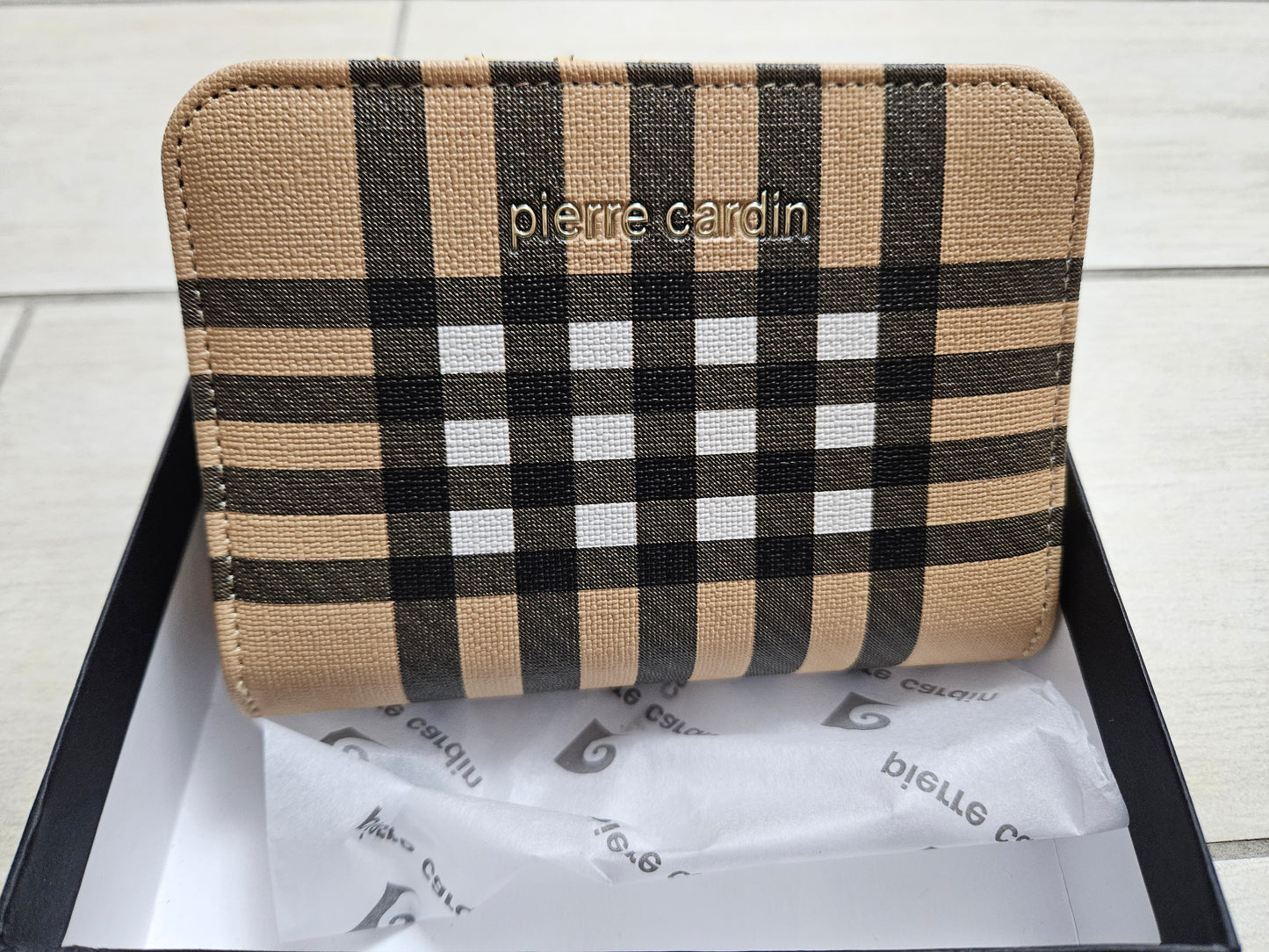 Borsellino Pierre Cardin fango