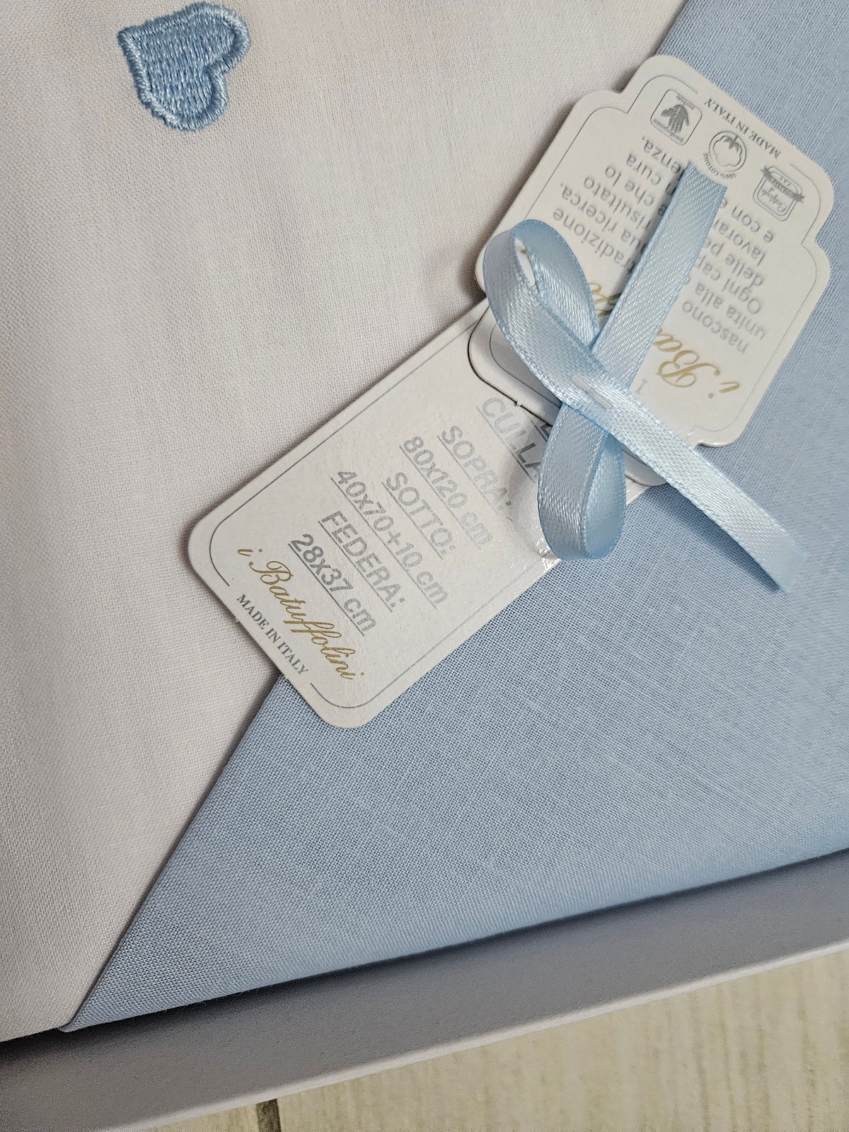 Completo i batuffolini cuore azzurro